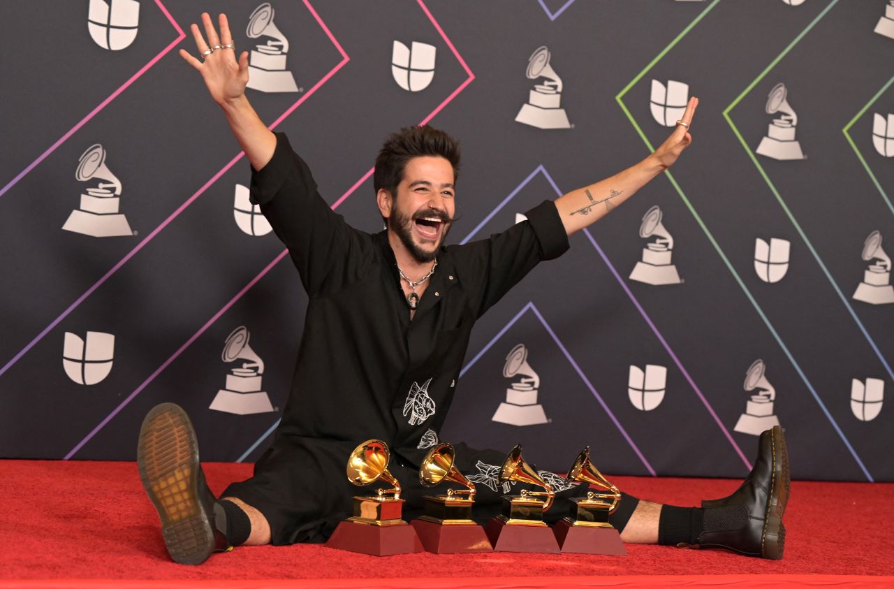 Colombian singer Camilo poses with his awards.