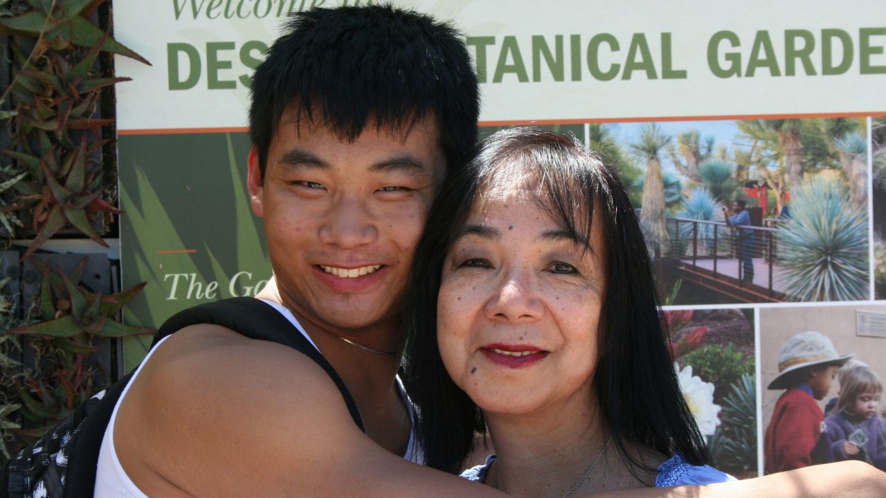 Christian Hall beside his mother Fe.