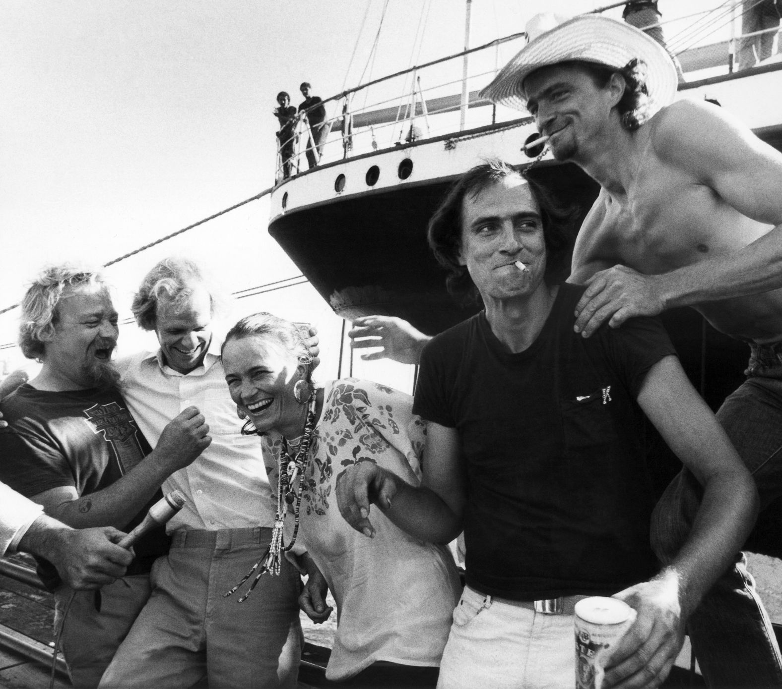 Taylor, second from right, and members of the Taylor family share a laugh in August 1981 prior to their concert at New York's South Street Seaport Museum to benefit the museum's Save Our Ships Fund.