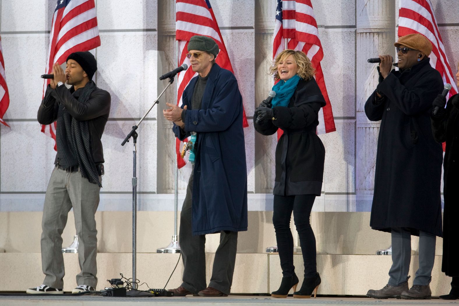 John Legend, Taylor, Jennifer Nettles and backup singers perform "Shower the People" during the We Are One: Inaugural Celebration at the Lincoln Memorial in Washington on January 18, 2009.