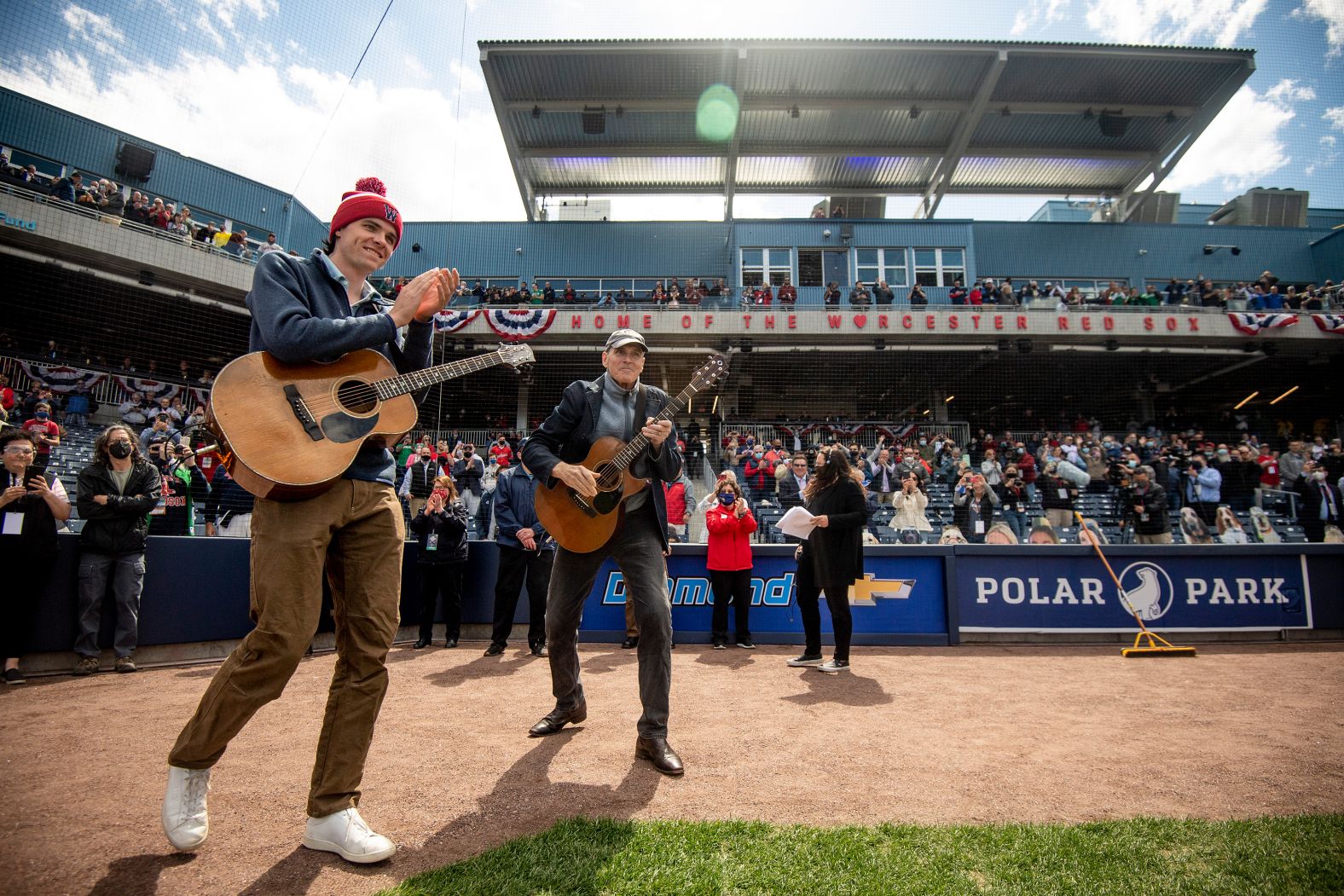 Taylor and his son Henry Taylor are introduced before singing the national anthem before the inaugural game at Polar Park between the Red Sox and the Mets in 2021. It was the first game ever played at Polar Park in Worcester, Massachusetts.