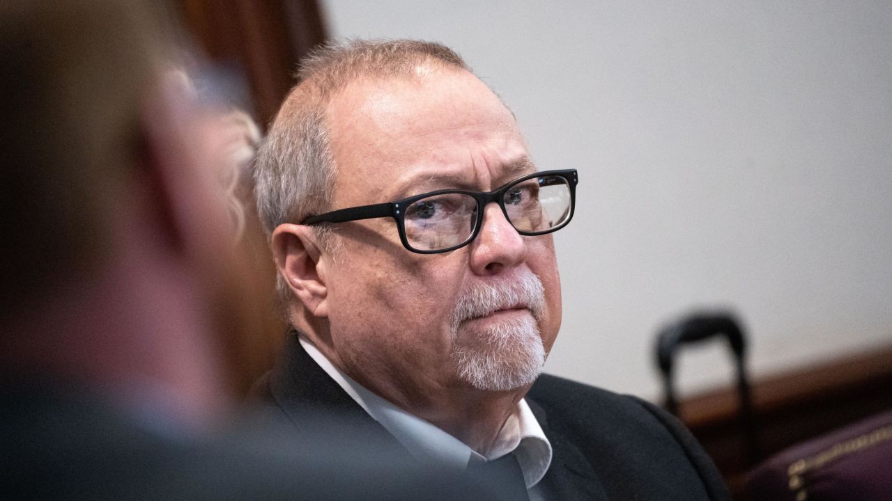 Defendant Greg McMichael listens during the trial over Ahmaud Arbery's shooting death on November 8, 2021, in Brunswick, Georgia.