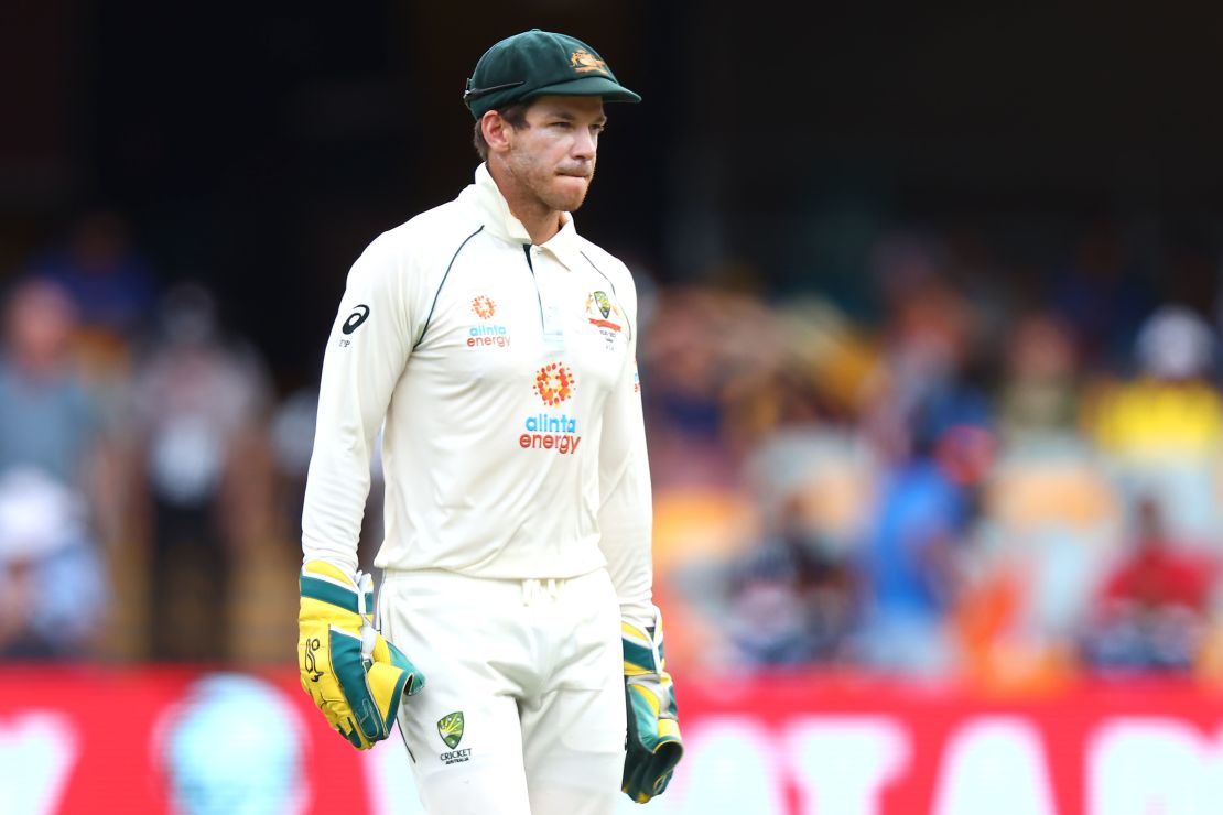 TOPSHOT - Australia's captain Tim Paine looks on between the overs on day five of the fourth cricket Test match between Australia and India at The Gabba in Brisbane on January 19, 2021. 