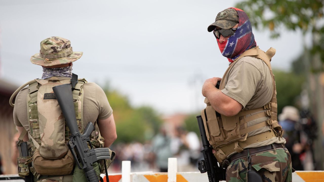 Members of far-right militias rally near Stone Mountain Park in Georgia on August 15, 2020.