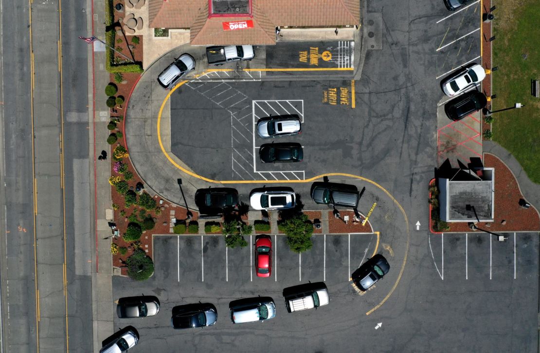 Cars line up at a McDonald's drive-thru on April 22, 2020 in Mill Valley, California. 