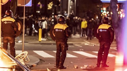 Rotterdam police shut down public transportation and ordered people to go home on Friday as protests escalated.