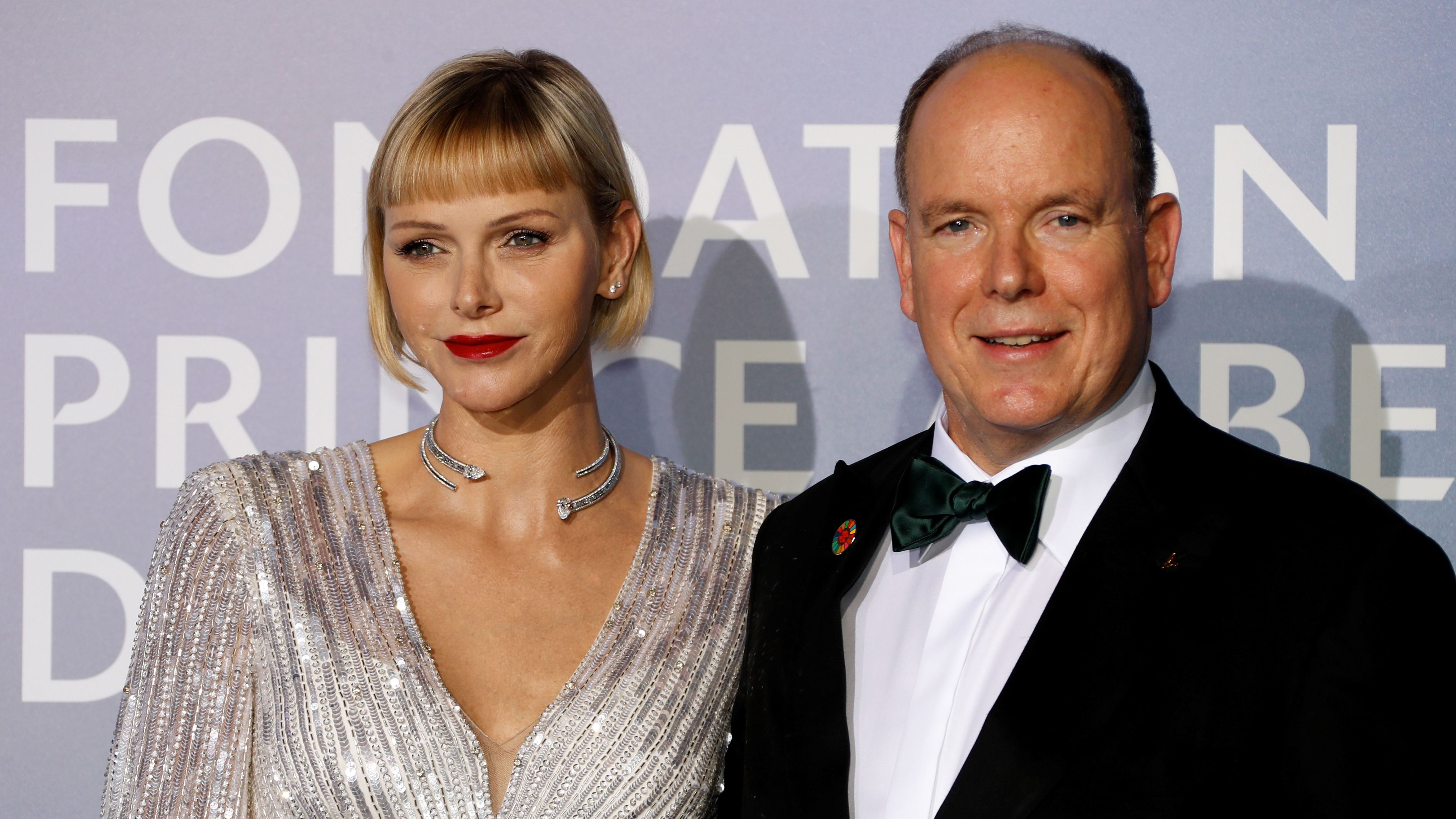 Prince Albert II and Princess Charlene pose on the red carpet ahead of the 2020 Monte-Carlo Gala for Planetary Health in Monaco in September 2020. 