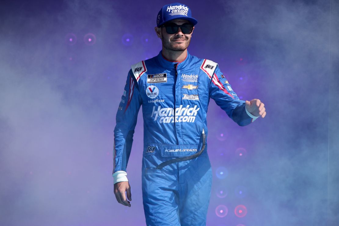 Kyle Larson, driver of the #5 HendrickCars.com Chevrolet, walks onstage during pre-race ceremonies prior to the NASCAR Cup Series Championship at Phoenix Raceway on November 07, 2021 in Avondale, Arizona. 