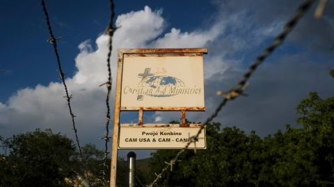 This Oct. 21, 2021, photo shows a sign outside Christian Aid Ministries in Titanyen, Haiti, which had 17 of their members kidnapped by the 400 Mawozo gang. 