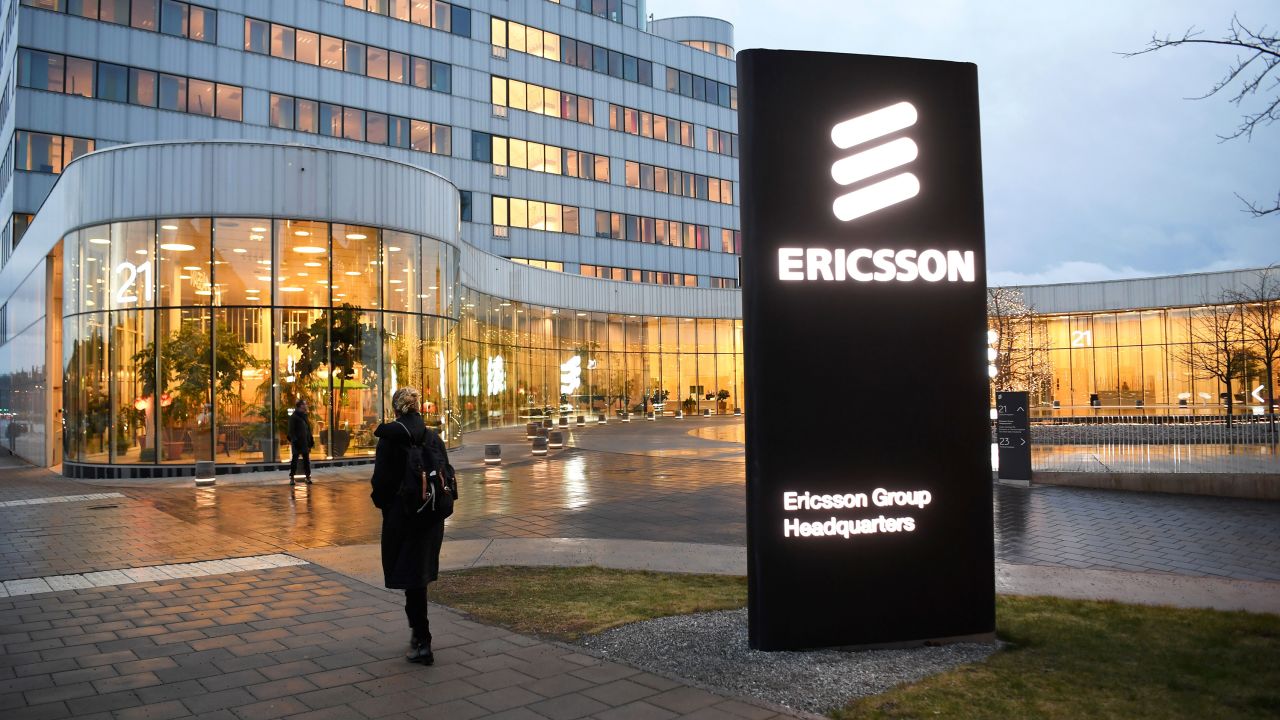 A woman walks past the Ericsson headquarters in Stockholm, Sweden, on January 24, 2020.