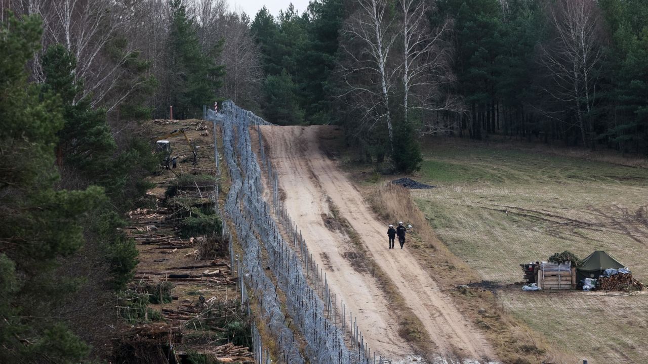 Polish police officers are seen on the Belarusian-Polish border.