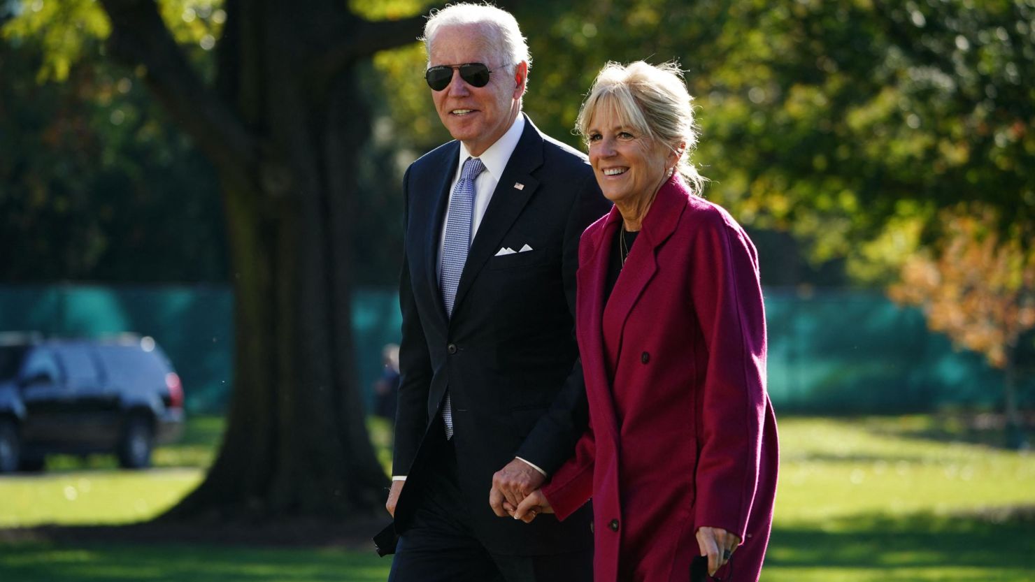 US President Joe Biden and First Lady Jill Biden walk across the South Lawn upon return to the White House in Washington, DC on November 8, 2021. - Biden returned to Washington, DC after spending the weekend in Rehoboth, Delaware.