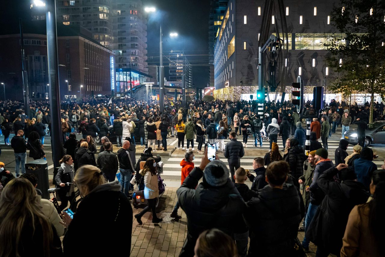 Protesters gather in Rotterdam's Coolsingel street on Friday.
