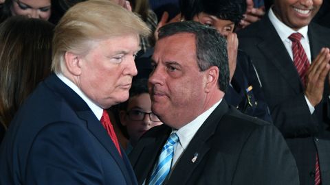 Then-New Jersey Gov. Chris Christie speaks with then-President Donald Trump on October 26, 2017, in the East Room of the White House in Washington, DC.