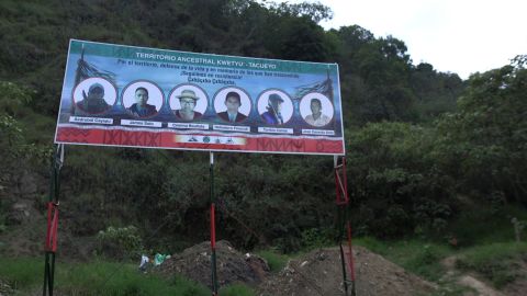 A large signboard memorializes an indigenous leader, Cristina Bautista, and four kiwes who were murdered in their car on October 29, 2019
