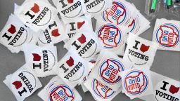 A stack of "I Love Voting" and "Ohio Voted" stickers wait to reward voters at the Wolfe Park Shelter House which served as a polling place on the East side of Columbus on Election Day, Tuesday, November 1, 2020.Mid Day Election Photos Bjp 19