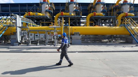 A worker walks in a gas treatment unit at the Slavyanskaya compressor station, operated by Gazprom.