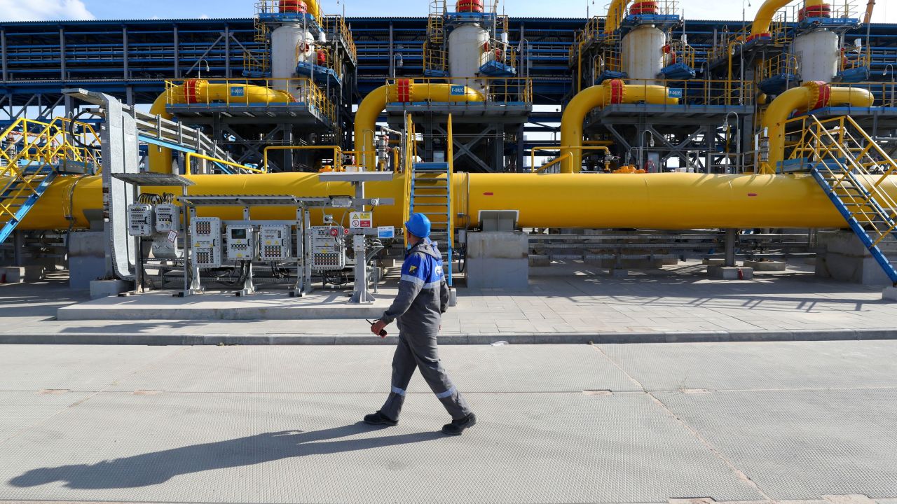 A worker walks in a gas treatment unit at the Slavyanskaya compressor station, operated by Gazprom.