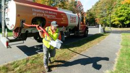 Paul Sabato, a driver with Heatable, delivers oil to a home in Scarborough on Wednesday, October 13, 2021. 
