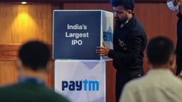 Workers prepare the stage during the listing ceremony for the IPO of One97 Communications Ltd., operator of PayTM, at the Bombay Stock Exchange in Mumbai, India, on Thursday, Nov. 18, 2021. 