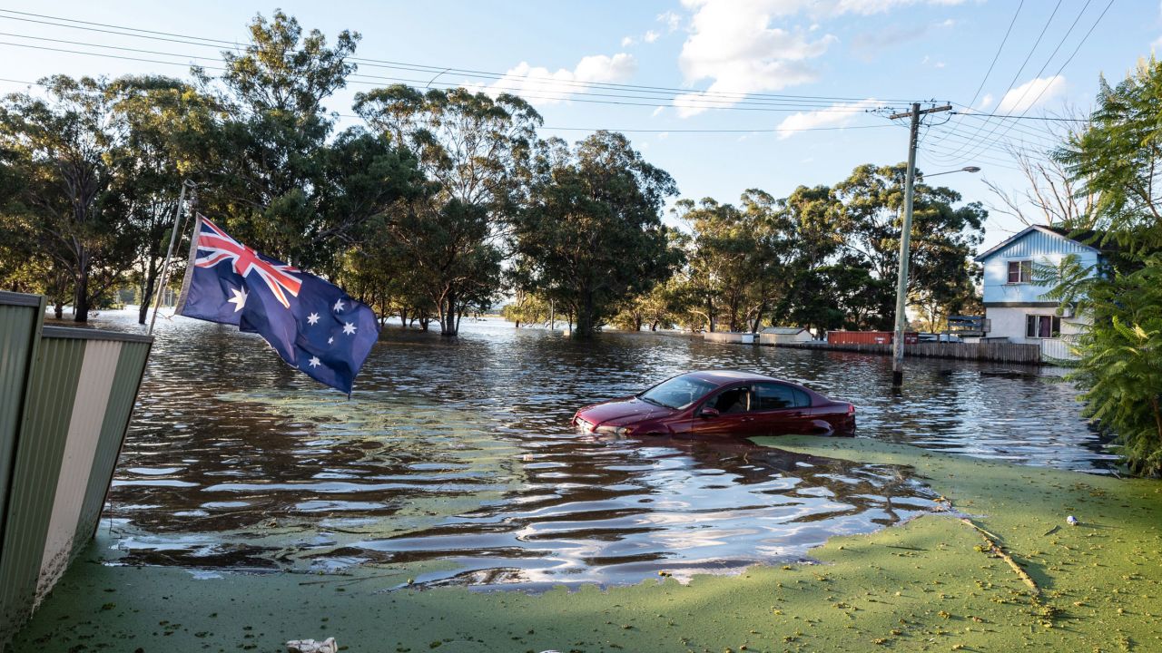 A car half submerged in a flood on March 24, 2021 in Sydney, Australia after days of continuous rain.