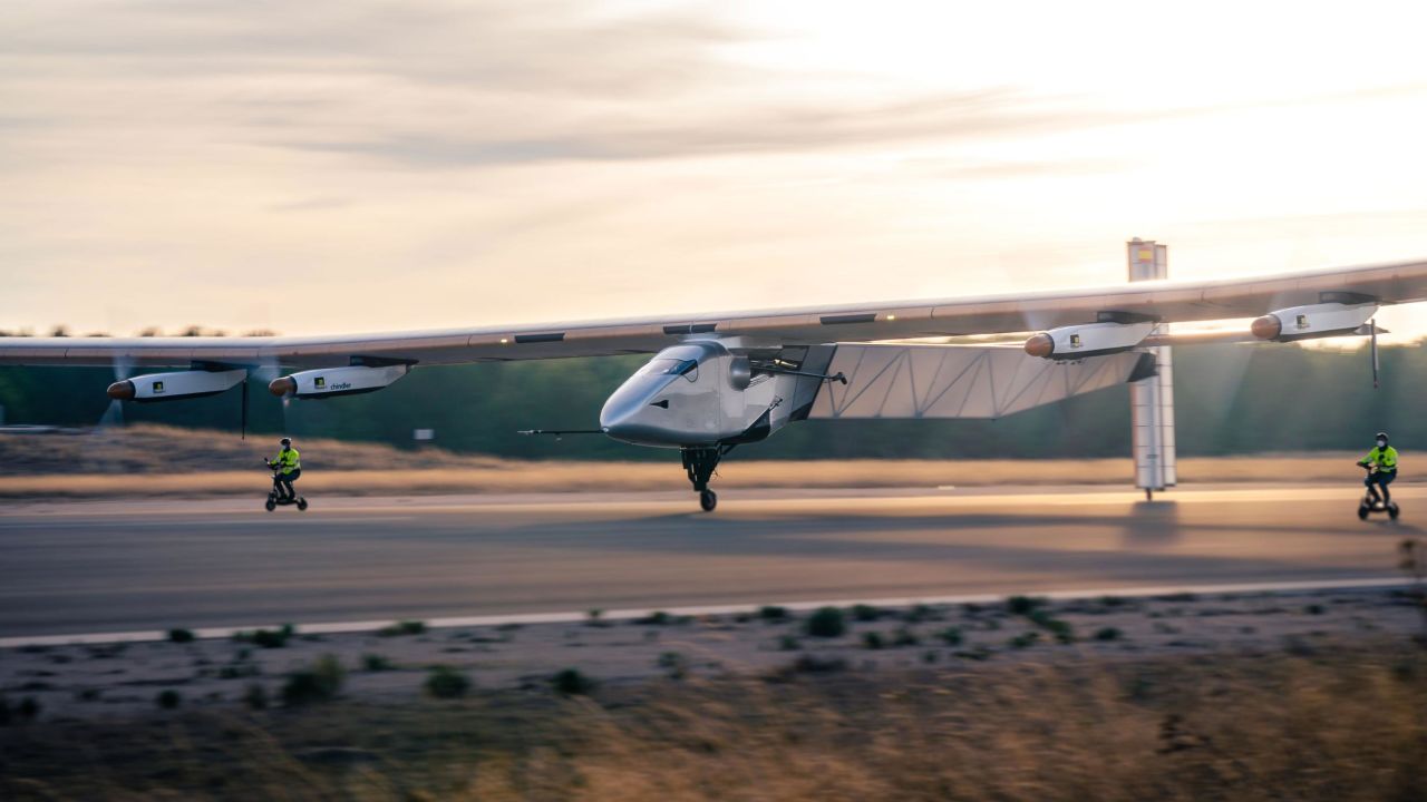 Skydweller Aero aims to produce the world's first commercially viable "pseudo-satellite" -- a solar-powered airplane capable of staying in the sky for months at a time. Skydweller is pictured landing after its first flight, in December 2020. The men on bikes are there to stabilize the aircraft by catching the poles protruding from the wing, a necessary step because of its tremendous wingspan.