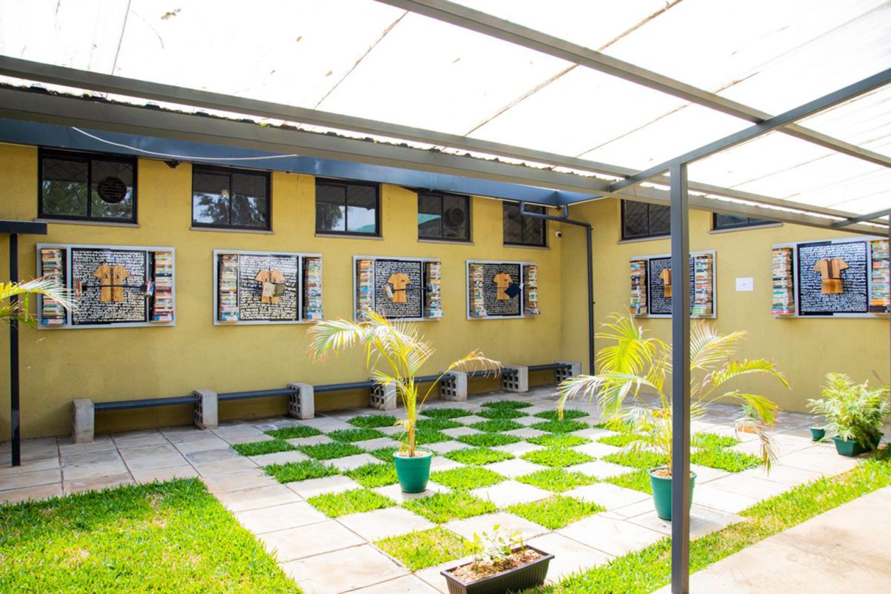 The team also put in new outdoor spaces, complete with fresh grass and gardens, that can accommodate an overflow of people when the library gets cramped with readers. They installed contemporary art in the courtyard at the Eastland Library to add some funky flair.