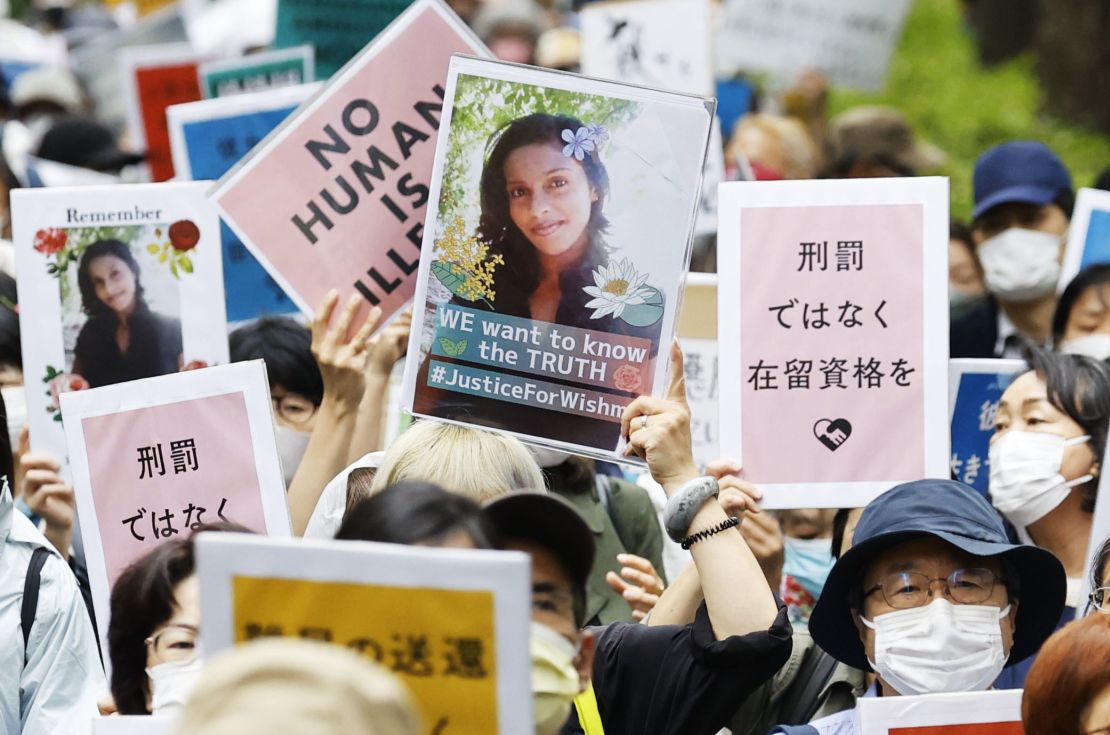People opposing the revision of Japan's immigration control and refugee recognition law march in Tokyo on May 16, 2021.