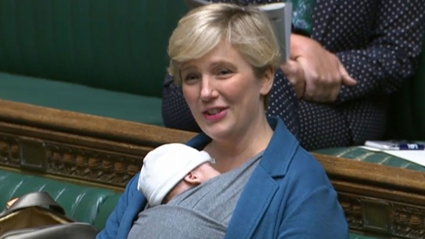 Labour MP Stella Creasy with her newborn baby in the chamber of Britain's House of Commons in September 