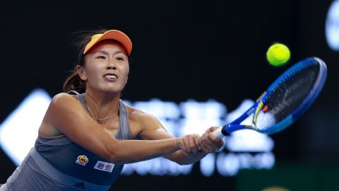 Peng Shuai of China returns a shot against Daria Kasatkina of Russia during the women's singles first round match of the 2019 China Open at the China National Tennis Center on September 28, 2019 in Beijing, China.