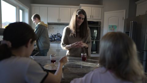 The Waits family eats breakfast in the kitchen of their dream home