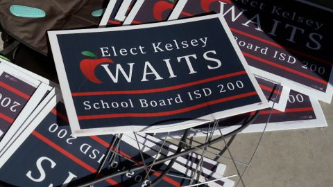 Kelsey Waits' campaign signs lie discarded.