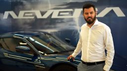 Mate Rimac, chief executive officer Rimac Automobili doo, beside a Nevera luxury electric supercar in the showroom at the company's plant in Sveta Nedelja, Croatia, on Thursday, July 8, 2021. 