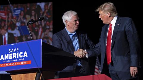 Former US President Donald Trump welcomes candidate for US Senate and US Rep. Mo Brooks to the stage during a "Save America" rally at York Family Farms on August 21, 2021 in Cullman, Alabama. 