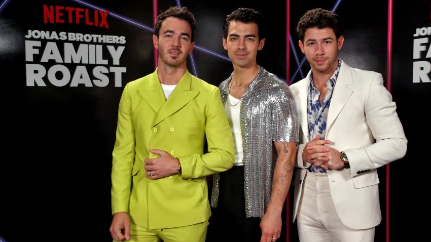 LOS ANGELES, CALIFORNIA - NOVEMBER 23: In this image released on November 23, 2021, (L-R) Kevin Jonas, Joe Jonas and Nick Jonas attend the Jonas Brothers Family Roast Netflix Comedy Special Taping at CBS Television City in Los Angeles, California. (Photo by Phillip Faraone/Getty Images for Netflix)