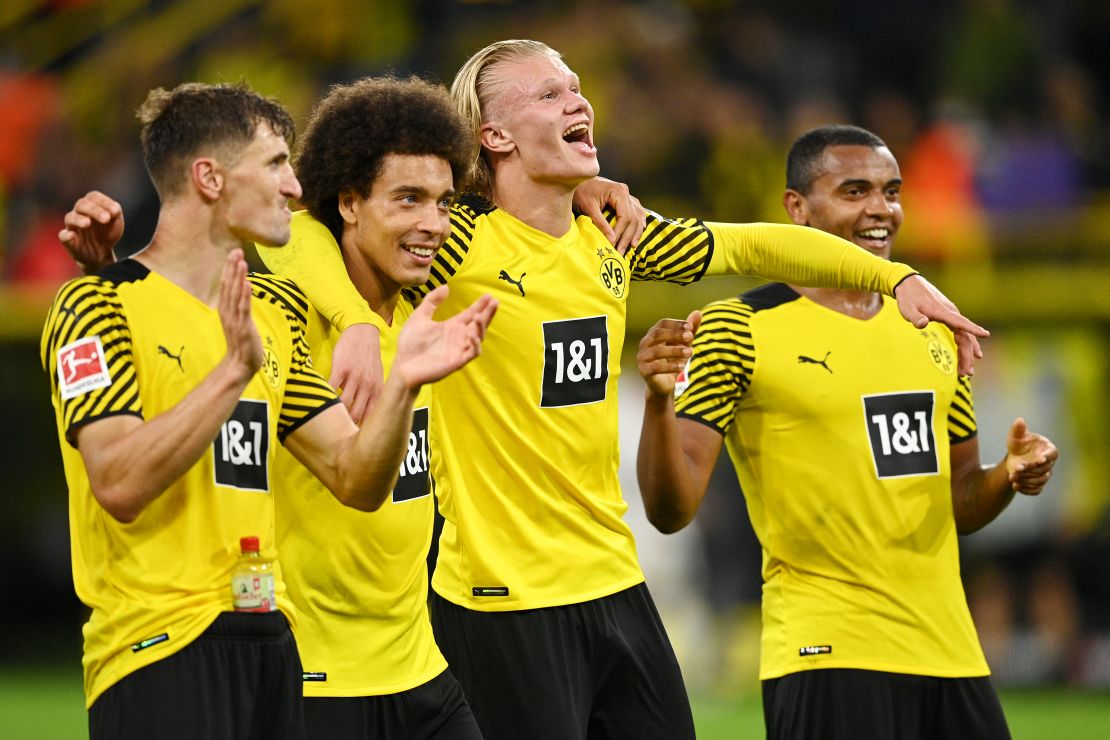 Witsel and Haaland (center) celebrate a goal against Hoffenheim in August.