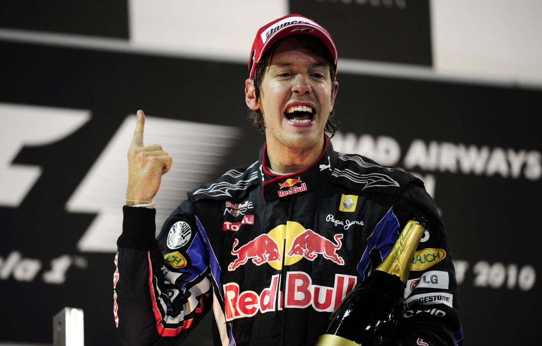 Vettel celebrates victory at Abu Dhabi en route to his 2010 world championship win.