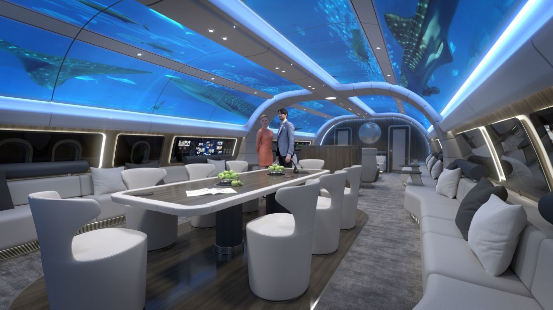 The cabin's ceiling features a projection system that can cover the interior walls and ceilings with whatever scenery those on board desire, including an underwater world.