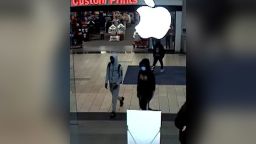Stills from surveillance footage o the theft robbery that occurred Wednesday, 11/24/21, in Santa Rosa, California, at the Apple Store in the Santa Rosa Plaza. Hand out stills from the Santa Rosa Police Department.