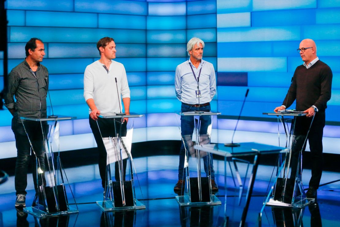 Ghorbani (far left) and Ekeland (second left) chat with the press alongside NRK sports director Egil Sundvor and broadcasting director of NRK Thor Gjermund Eriksen in Oslo on November 24.