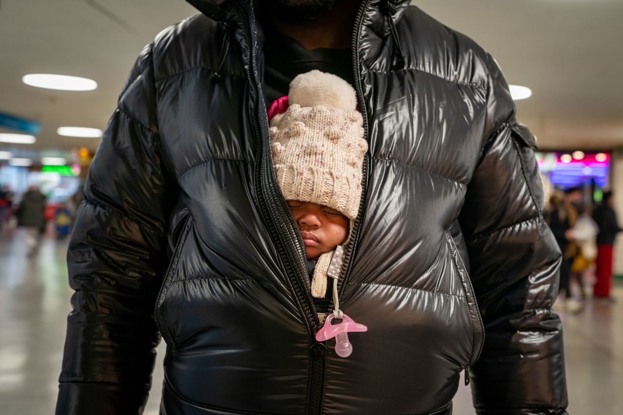 A young traveler naps at New York's Penn Station on November 24.