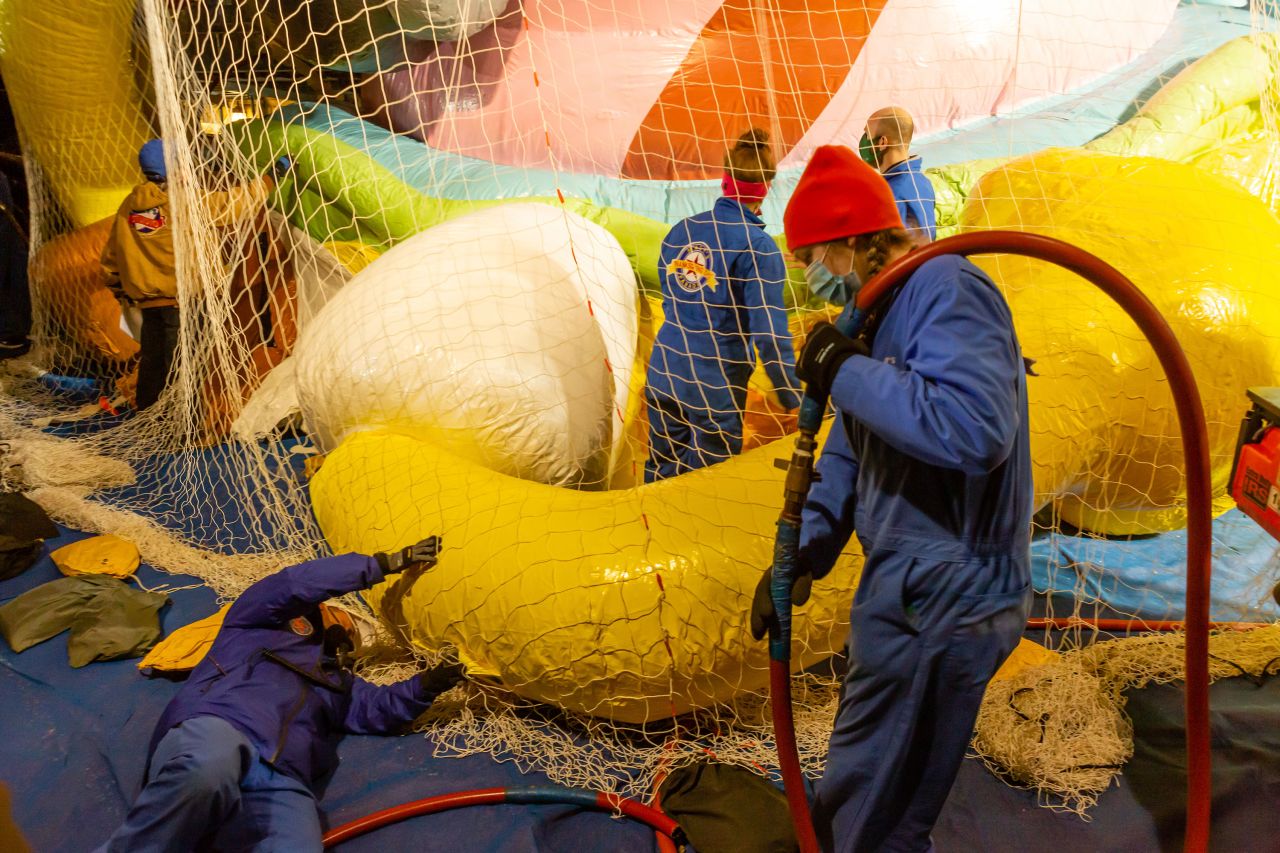 Workers in New York inflate the SpongeBob SquarePants balloon on November 24.