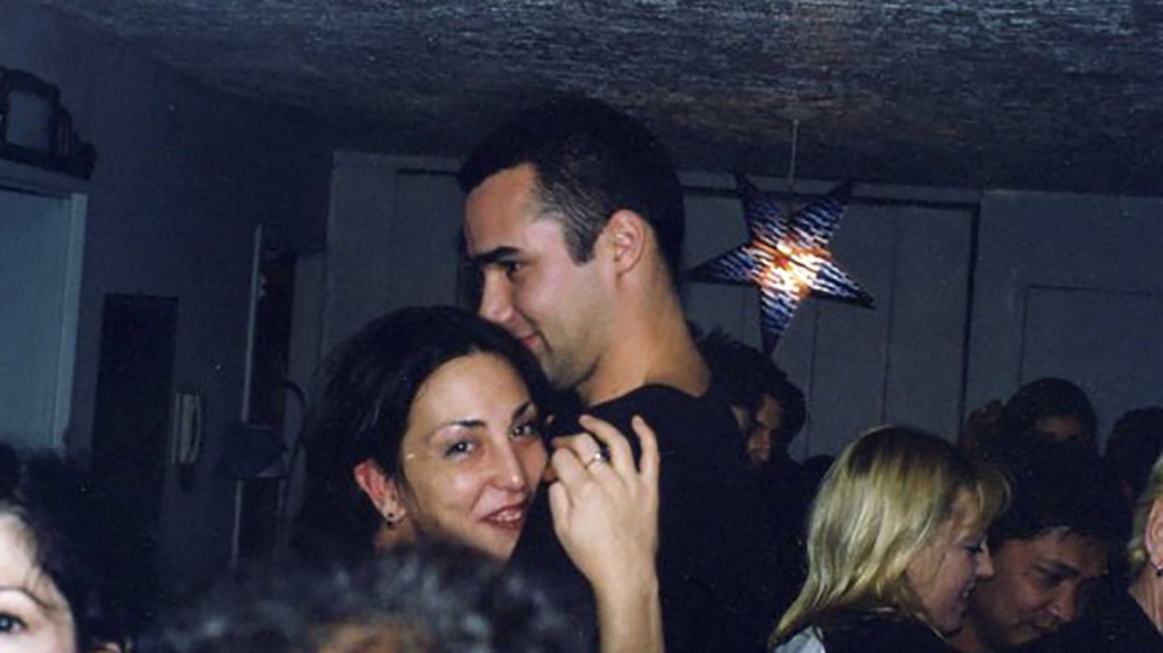 <strong>Millennium proposal: </strong>The couple got engaged at a New Year's Eve party on December 31, 1999. This photo was taken right after Richard asked Dina to marry him as the clock struck midnight. She said yes.