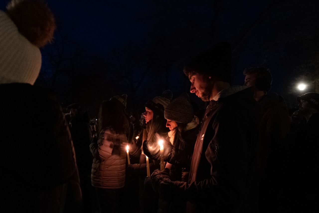 Mourners gather at a candlelight vigil in Waukesha, Wisconsin, on Monday, November 22. A driver <a href="https://www.cnn.com/2021/11/25/us/waukesha-car-parade-thursday/index.html" target="_blank">rammed an SUV through a Christmas parade</a> in Waukesha that weekend, killing six people and injuring dozens.