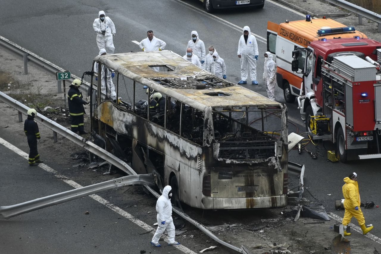 Officials work at the site of a <a href="https://www.cnn.com/2021/11/23/europe/bulgaria-bus-fire-intl-hnk/index.html" target="_blank">deadly bus fire</a> near the village of Bosnek, Bulgaria, on Tuesday, November 23. At least 45 people were killed when the bus crashed and caught fire. The cause of the accident was unclear, but the bus appeared to have hit a highway barrier either before or after it caught fire, officials said.