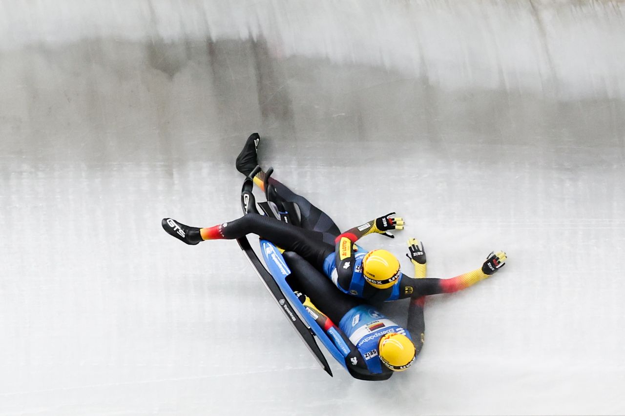 German lugers Toni Eggert and Sascha Benecken lose their sled as they compete at a World Cup event in Beijing on Sunday, November 21.