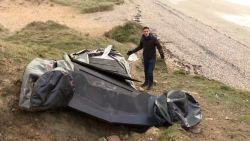 CNN's Cyril Vanier reports from a beach near Calais, France, after at least 27 people died when their boat capsized marking one of the largest losses of life in the English Channel in recent years.
