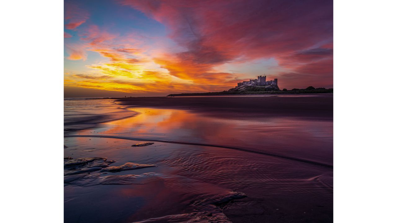 <strong>Bamburgh Castle, England:</strong> In Northumberland, it was the first castle in England to fall in 1464 during the War of the Roses. This sunset snapshot was taken by Scott Antcliffe.