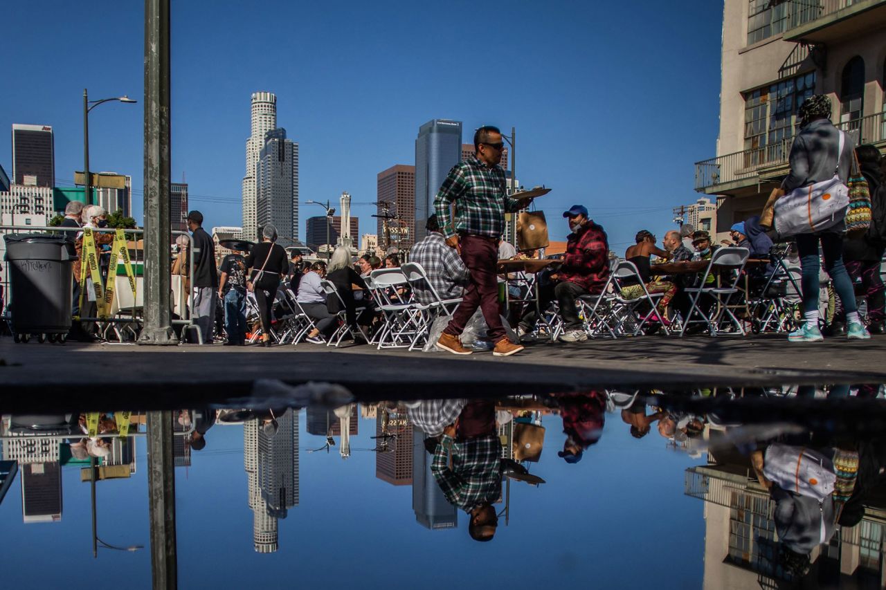 The nonprofit Midnight Mission served a Thanksgiving meal to nearly 2,000 homeless people in the Skid Row neighborhood of downtown Los Angeles.