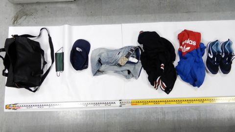 Clothes used by the suspect to avoid being tracked are displayed by the police. Photo courtesy of the police